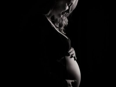 Striking monochrome image capturing the beauty and elegance of pregnancy.